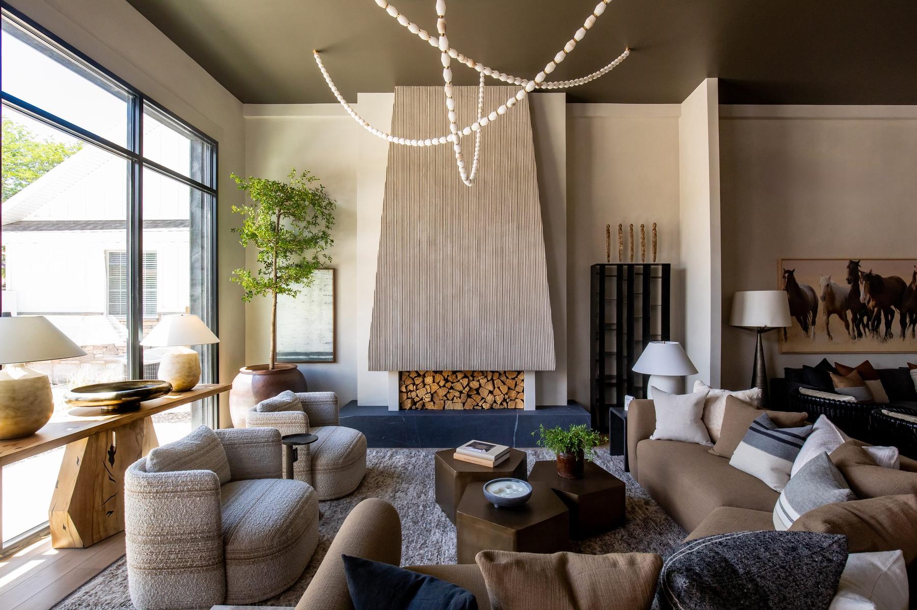 The Kora Home Artistry showroom fireplace seating area