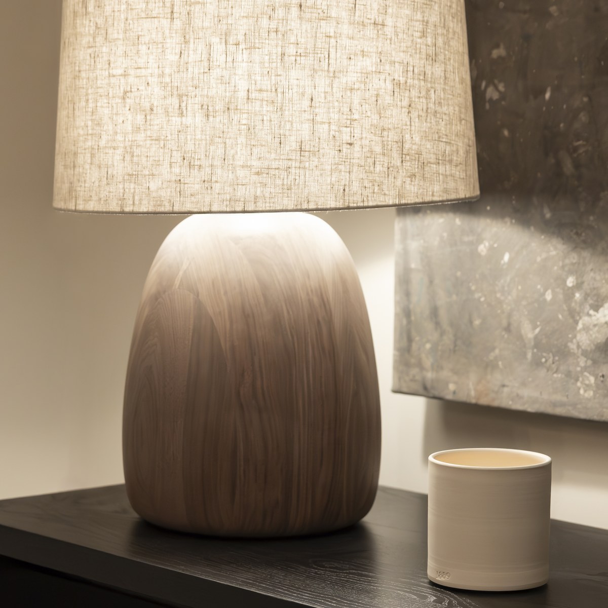 Turned wood lamp with a linen shade