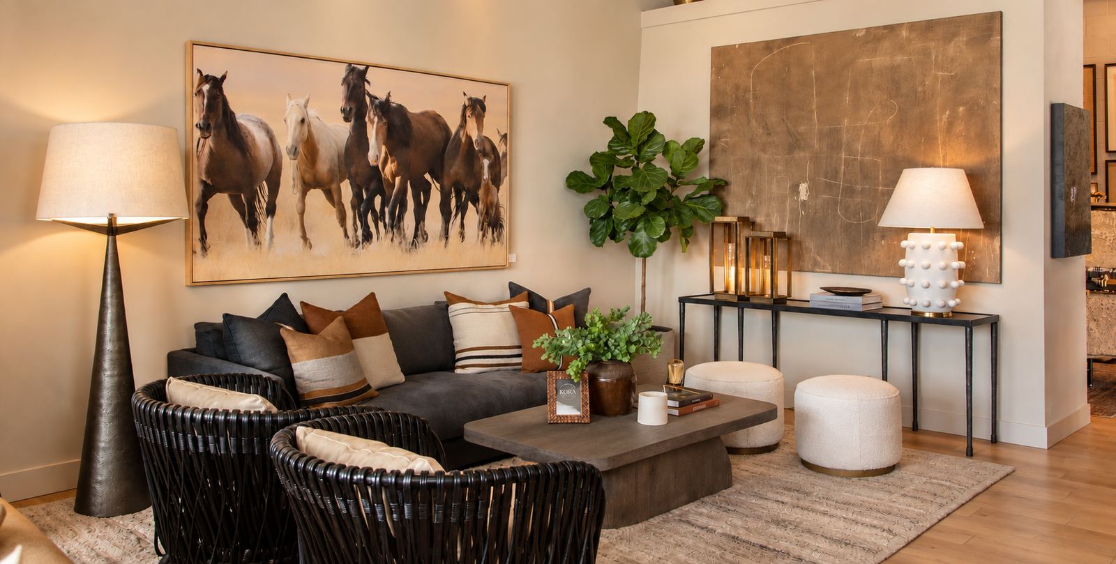 Living vignette with art, seating and lighting at the Kora showroom